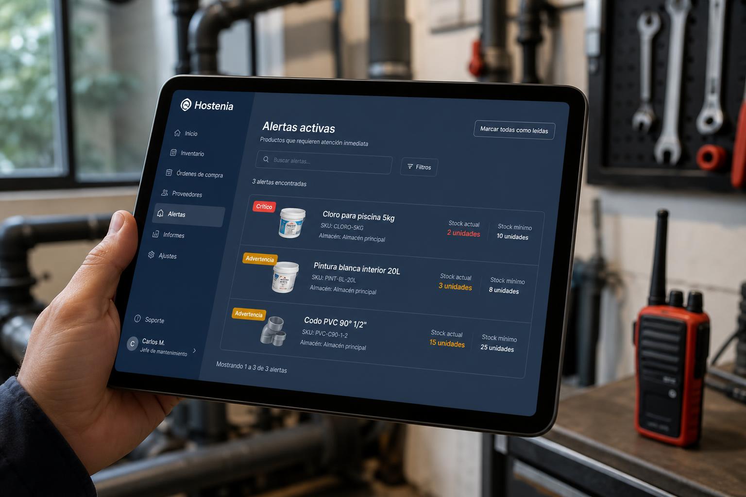 Vista de alertas activas de Hostenia con artículos de mantenimiento en stock bajo